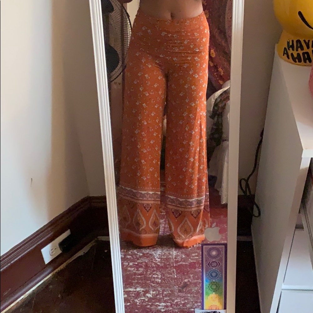 Orange paisley flared pants